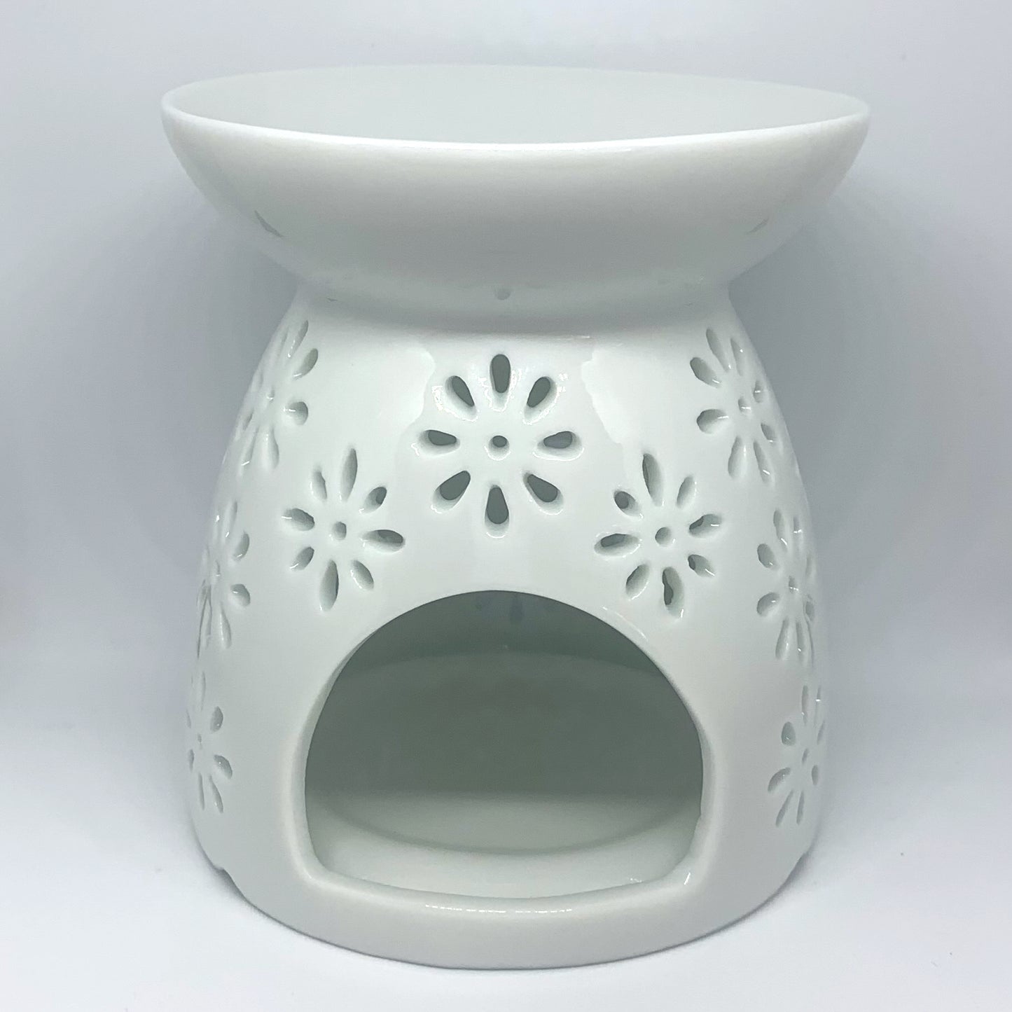 Ceramic White Daisy Wax Burner against a white background.